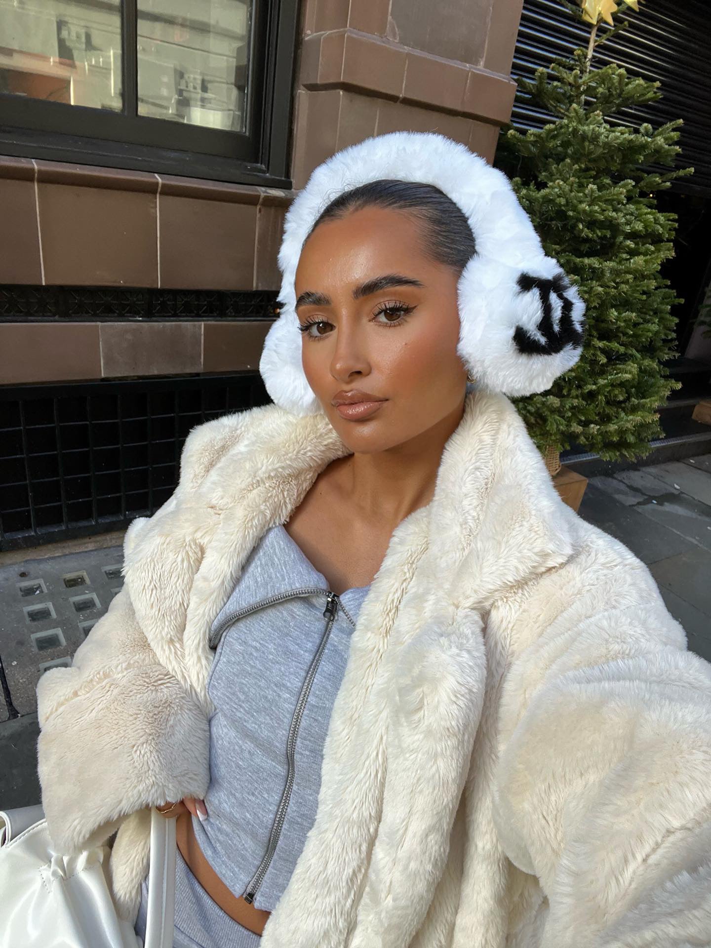Double c faux fur earmuffs in white