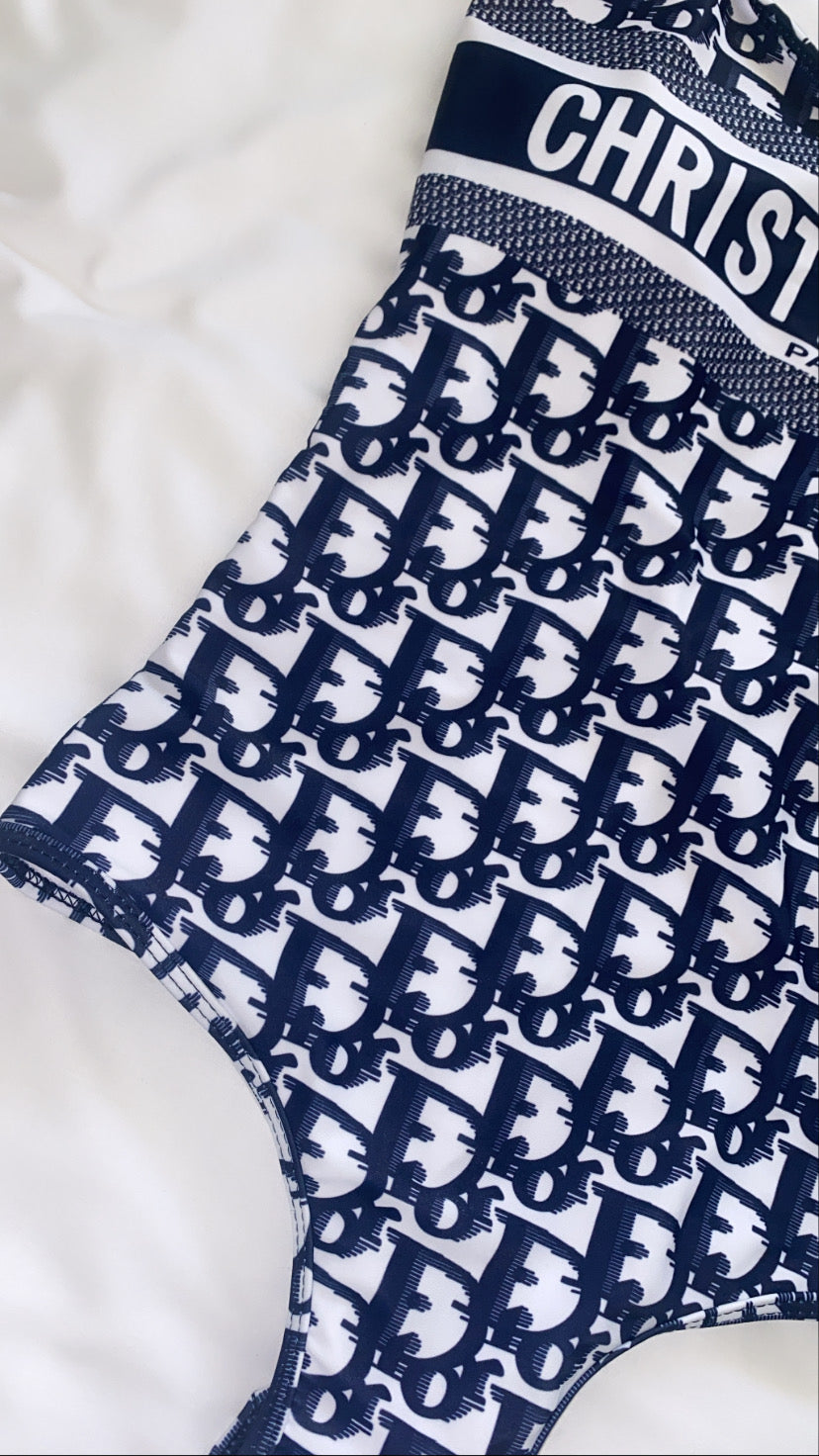 Adore her swimsuit in navy