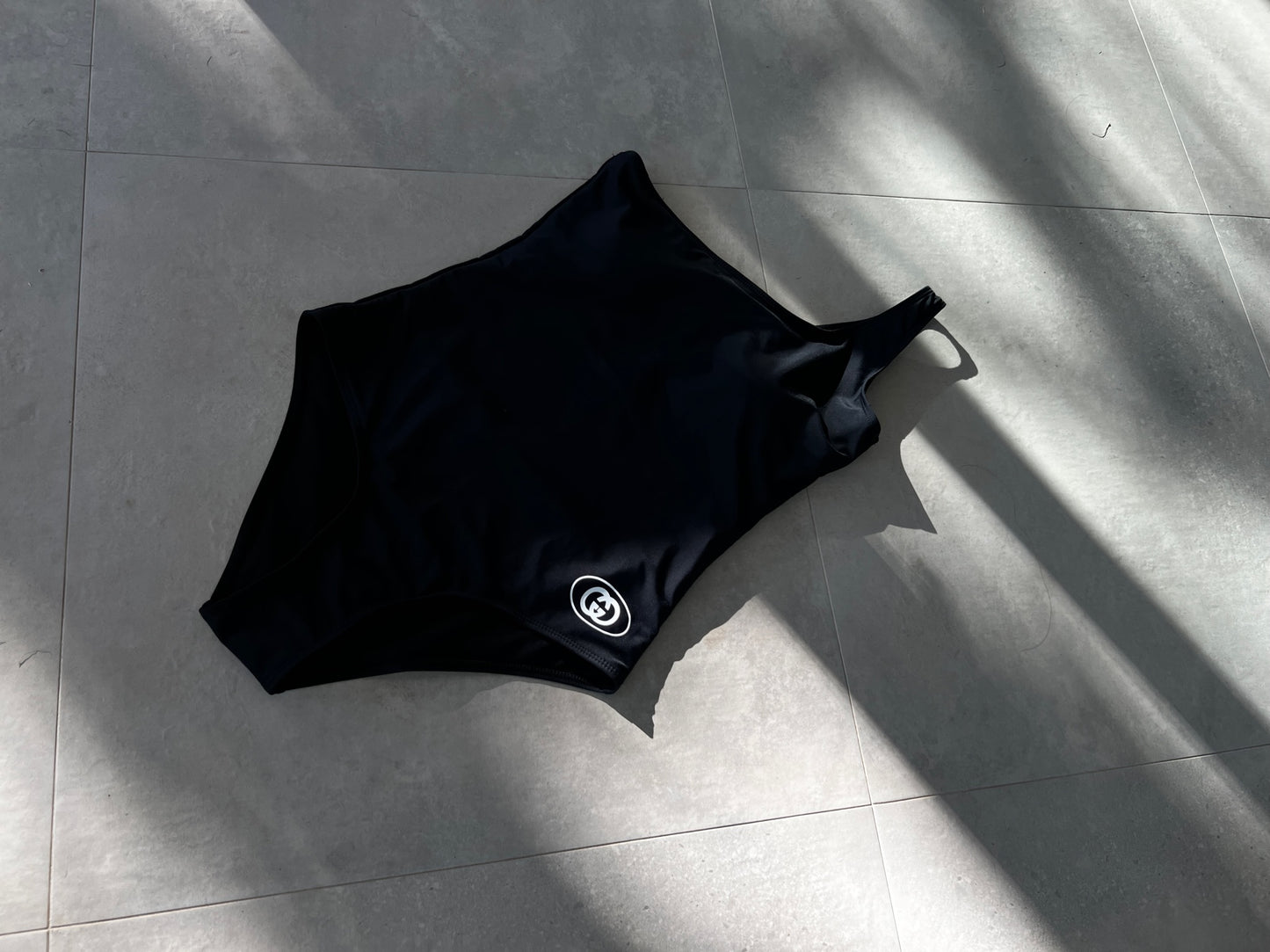 GG one shoulder black swimsuit