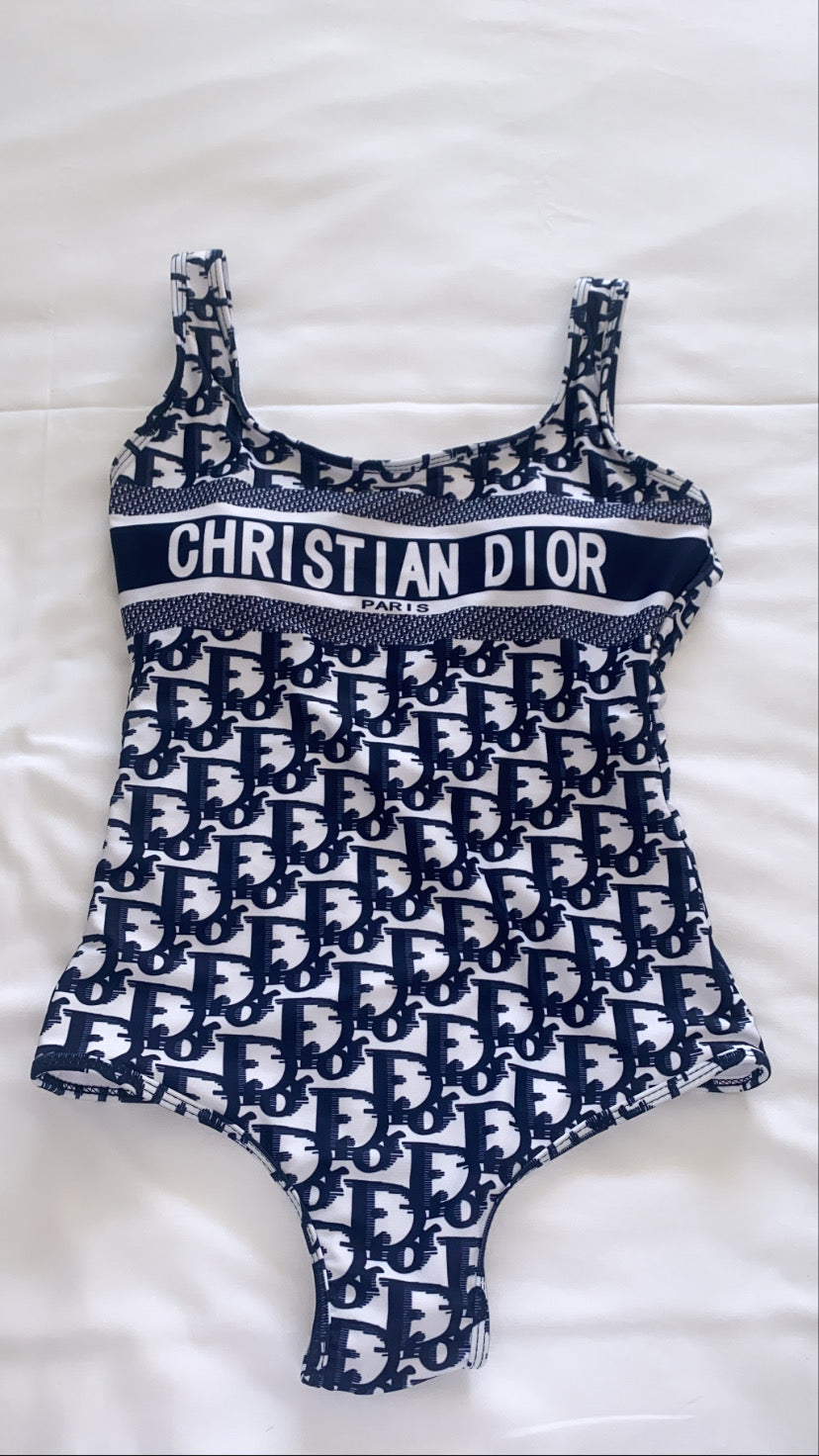 Adore her swimsuit in navy